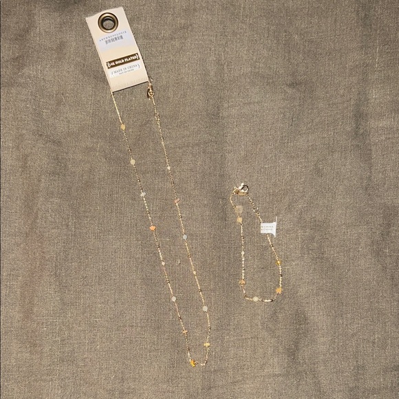 Anthropologie Jewelry - Anthropologie Gold Necklace & Bracelet Set